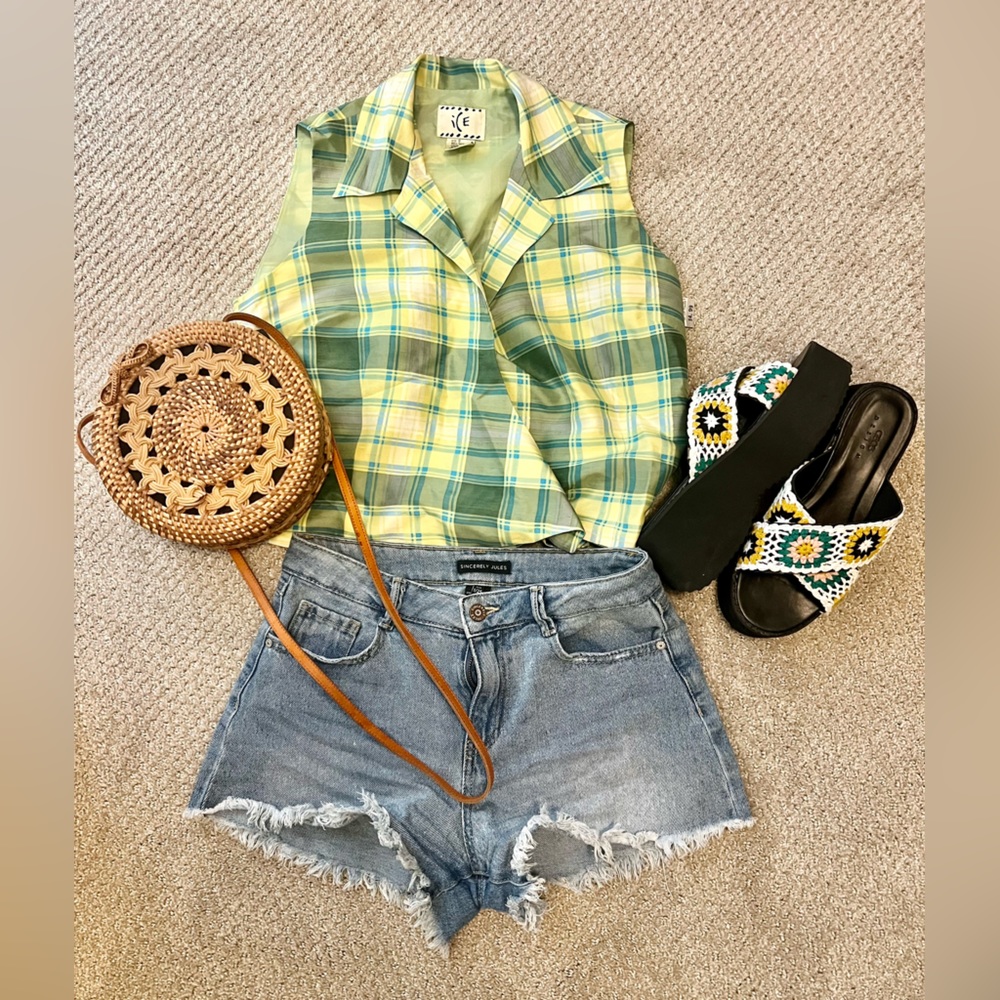 Flirty vintage wraparound sleeveless top